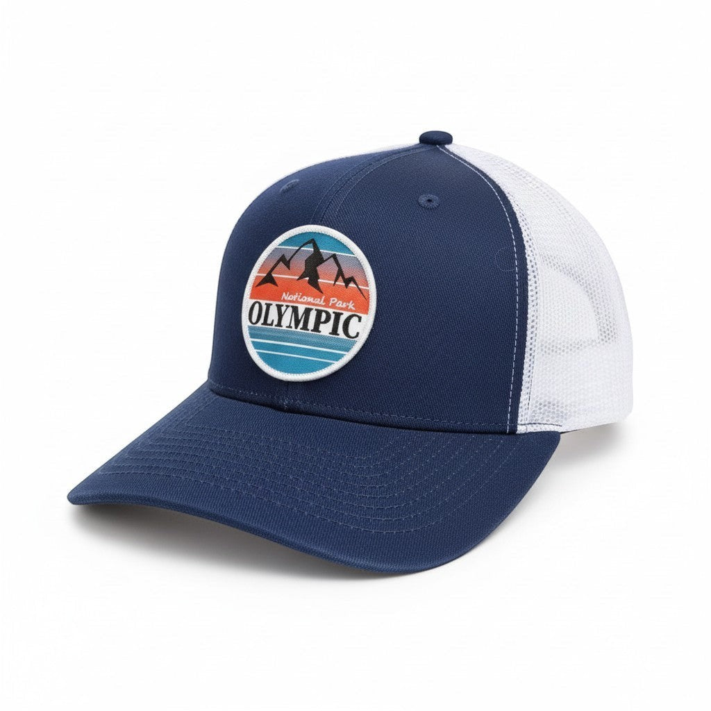 Moove Headwear navy blue trucker hat with white mesh back and Olympic National Park graphic patch.