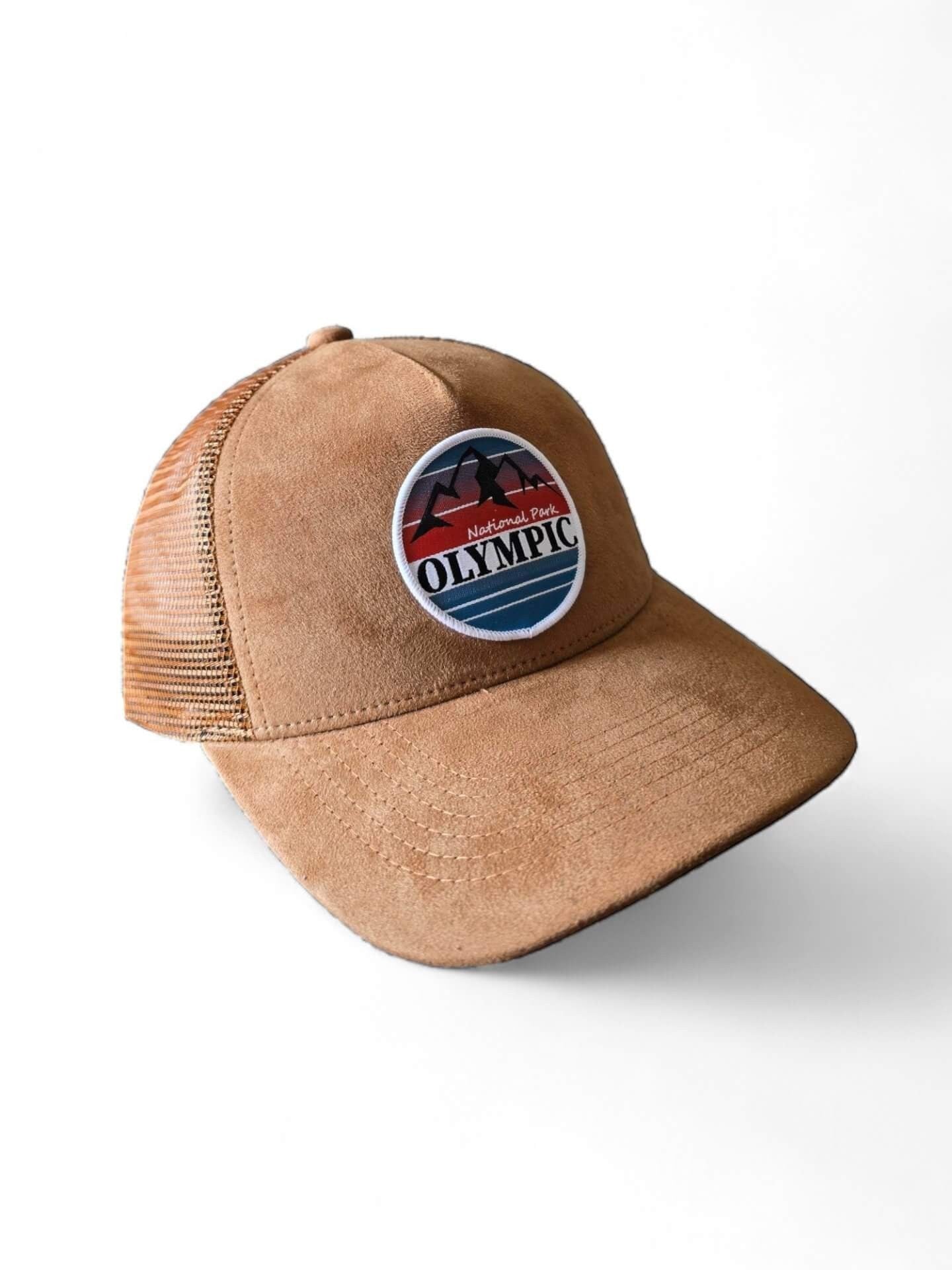 Moove Headwear tan suede trucker hat with mesh back and Olympic National Park patch. Adjustable snapback.
