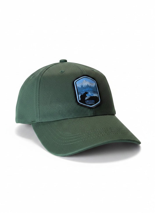 Moove Headwear dark green baseball cap with scenic Oregon mountain patch and adjustable strap