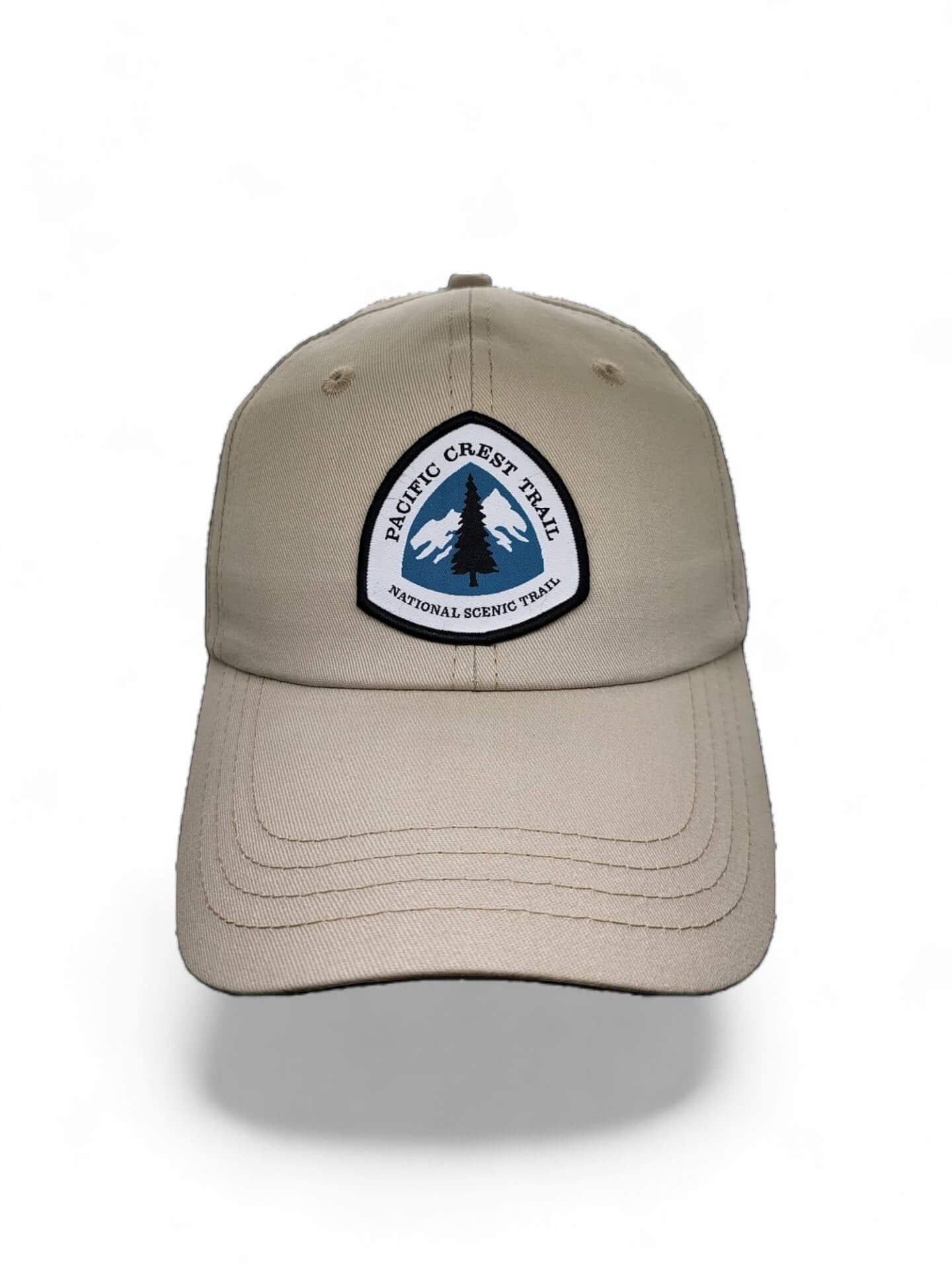 Moove Headwear tan cotton baseball cap with embroidered Pacific Crest Trail logo, adjustable strap, breathable fabric.