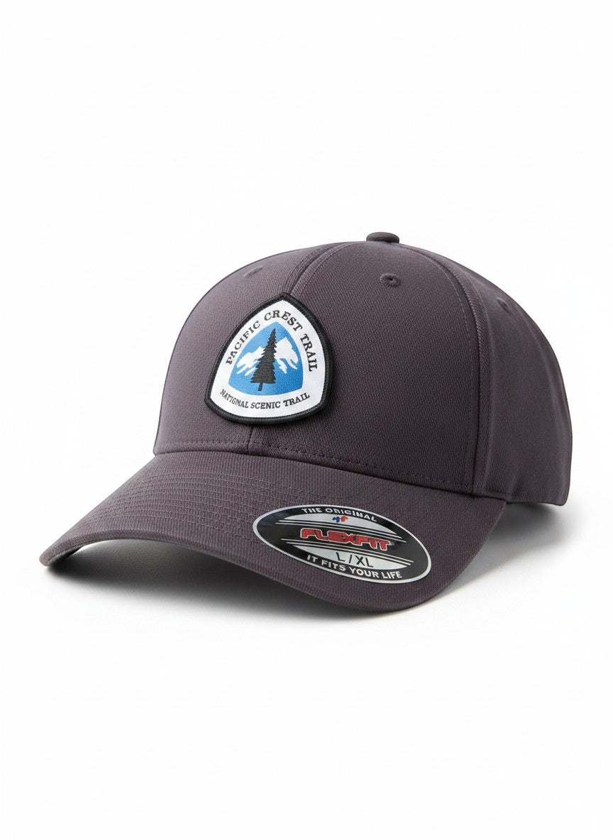 Moove Headwear Pacific Crest Trail patch cap in dark grey with Flexfit sizing label.