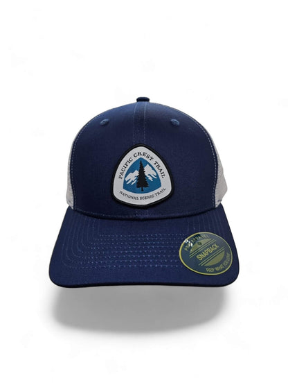 Moove Headwear navy blue trucker hat with white mesh back and Pacific Crest Trail patch. Adjustable snapback closure.