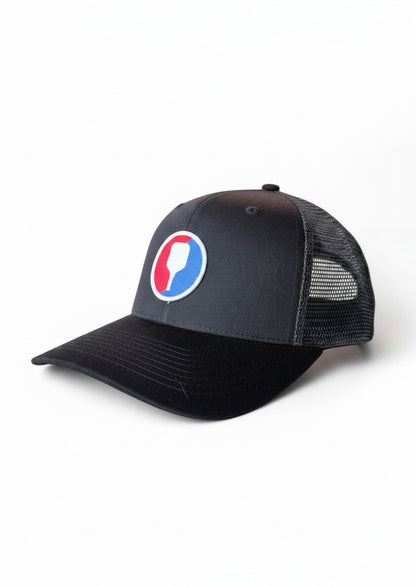 Moove Headwear dark grey trucker hat with black brim and pickleball paddle patch. Mesh back.