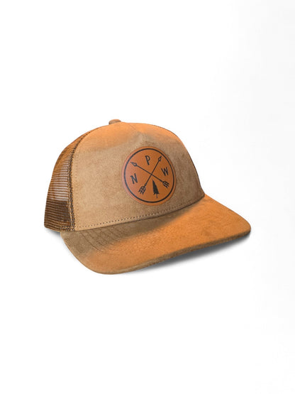 Moove Headwear tan suede mesh snapback hat with PNW Arrows leather patch and adjustable closure.