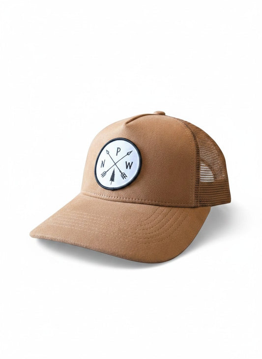 Moove Headwear tan suede trucker hat with mesh back and PNW arrow patch. Adjustable snapback for a custom fit.