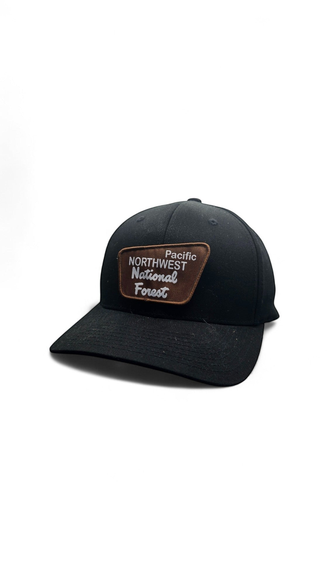 Moove Headwear black baseball cap with a brown patch logo for Pacific Northwest National Forest. Unisex Flexfit.