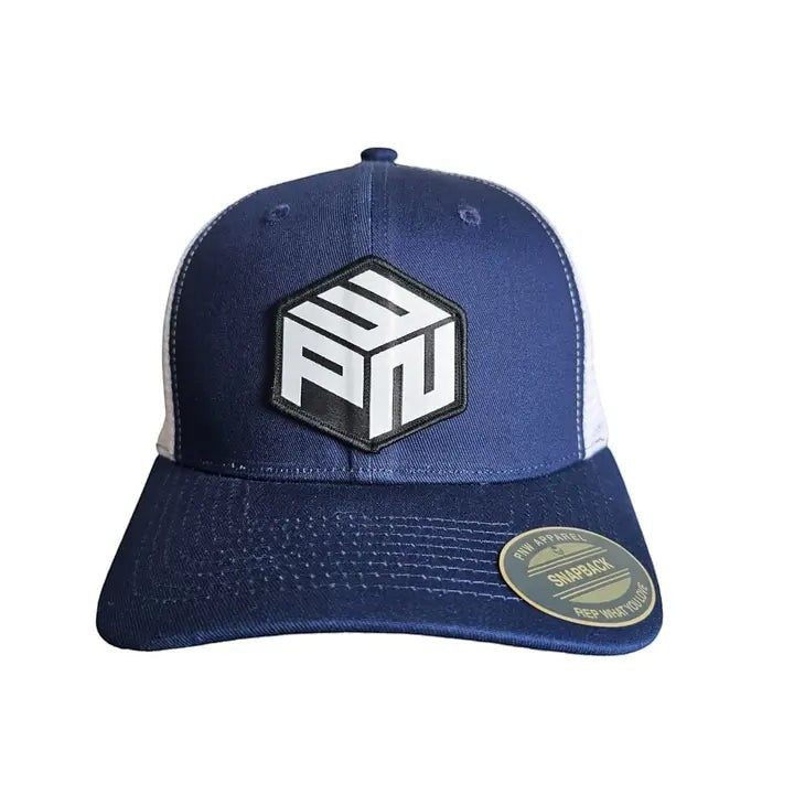 Moove Headwear navy blue trucker hat with white mesh back and a hexagonal PNW patch on the front.