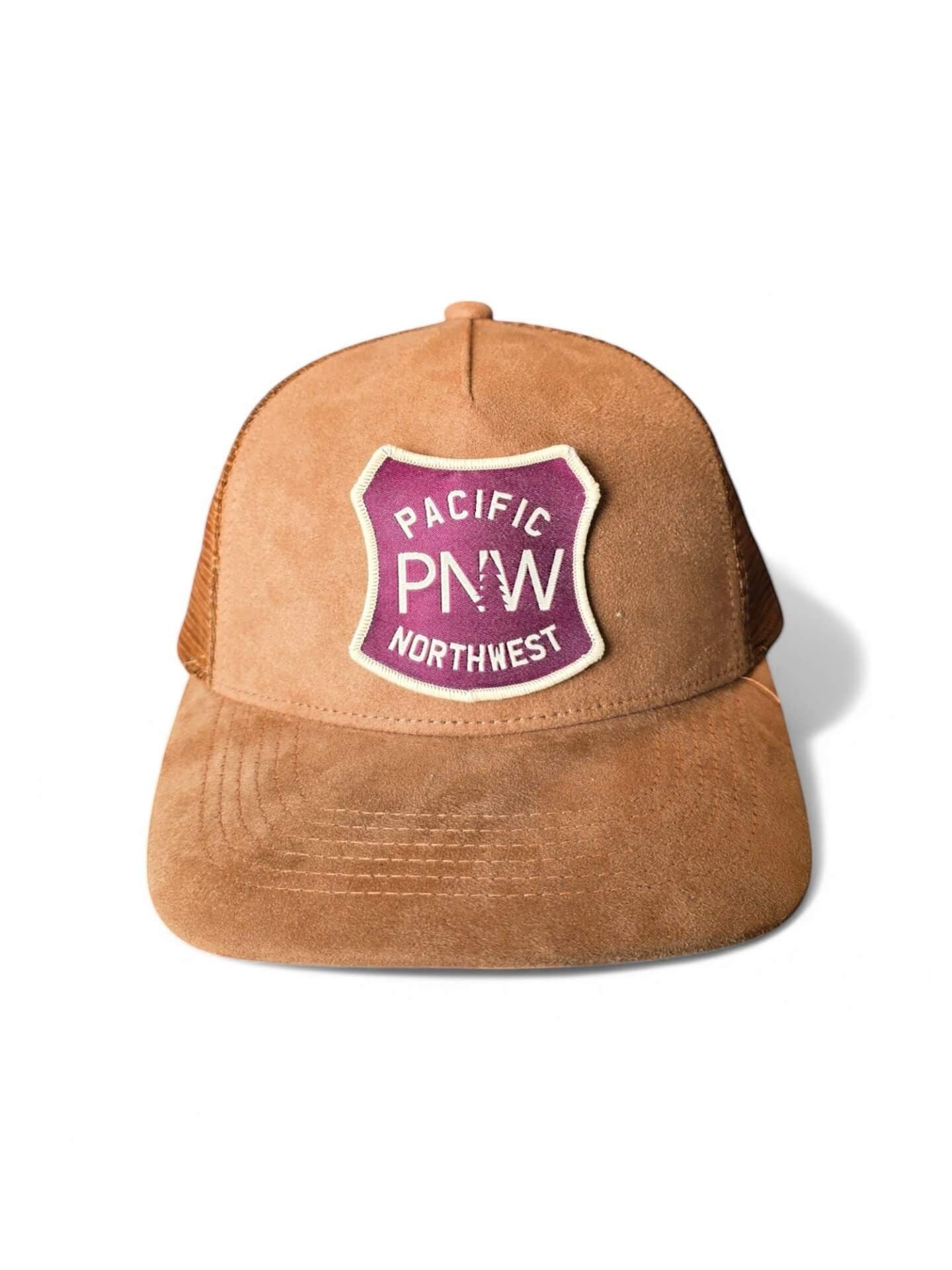 Moove Headwear brown suede trucker hat with mesh back and PNW Pacific Northwest patch. Adjustable snapback.