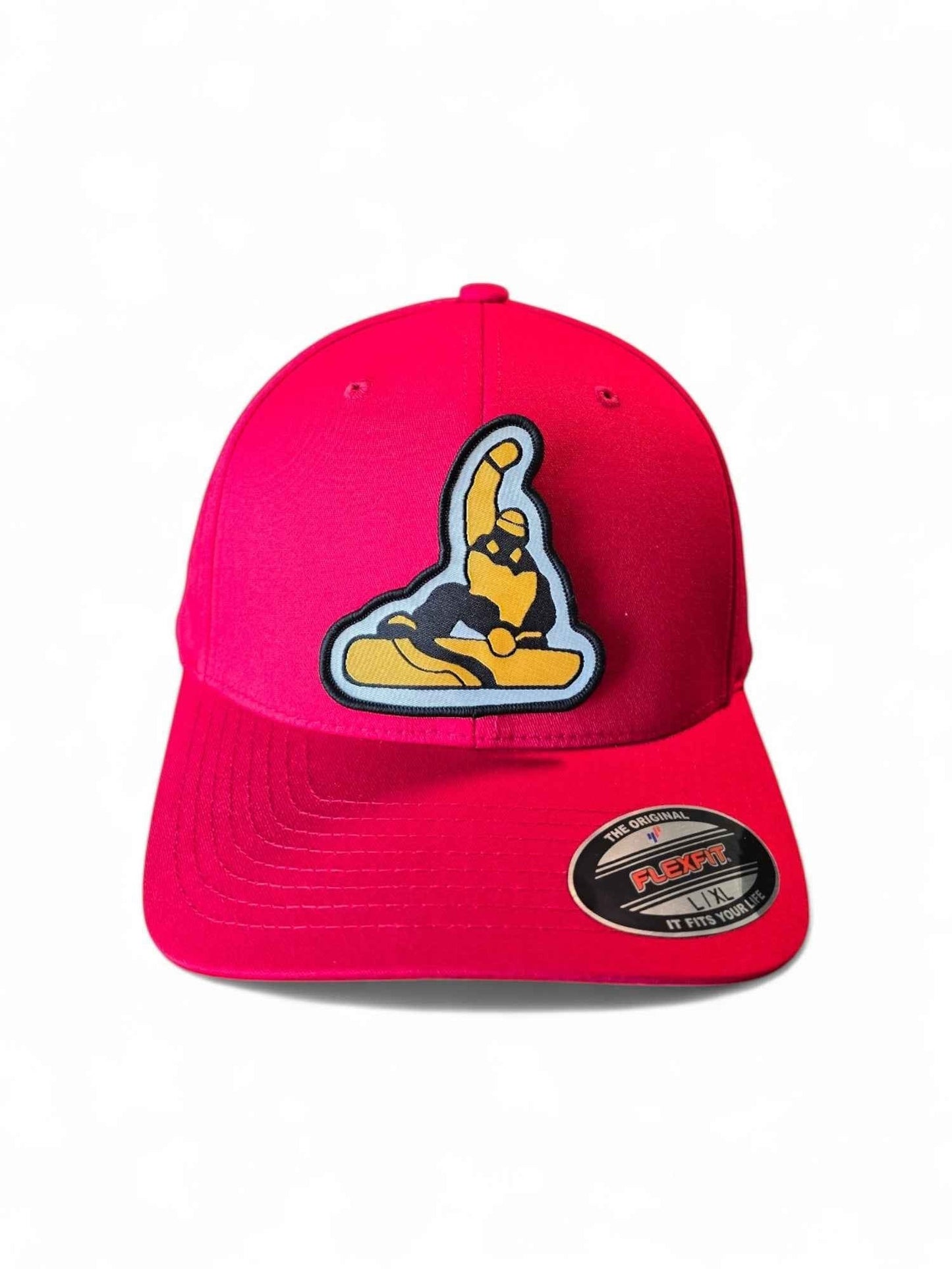 Moove Headwear red fitted cap with a black and gold snowboarder patch. Mid-profile structured crown, Flexfit design.