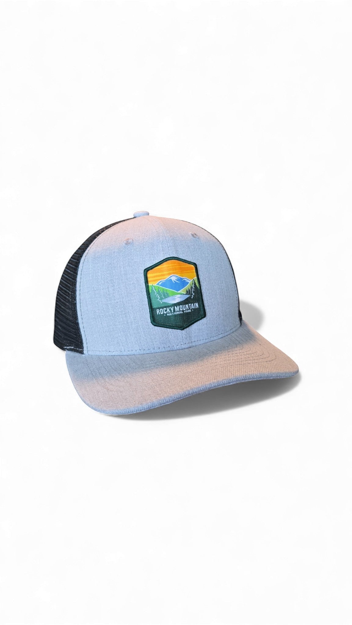 Moove Headwear light blue trucker hat with black mesh back and Rocky Mountain National Park logo patch.