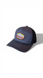Moove Headwear navy blue trucker hat with Saguaro National Park embroidered patch and mesh back.