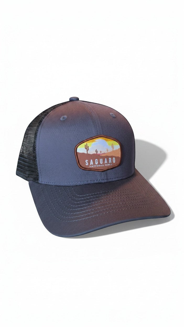 Moove Headwear Saguaro National Park embroidered patch trucker hat with breathable mesh back and adjustable snap closure.
