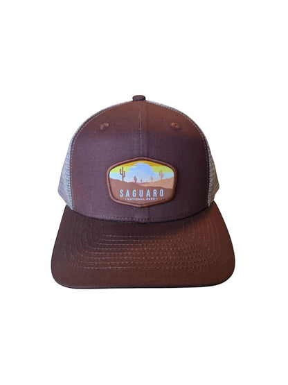 Moove Headwear brown trucker hat with Saguaro National Park embroidered patch and mesh back.