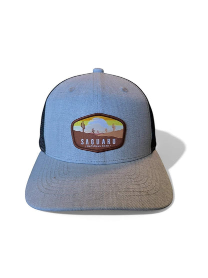 Moove Headwear light blue trucker hat with Saguaro National Park embroidered patch and mesh back.