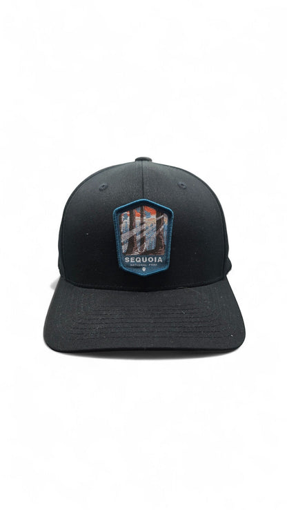 Moove Headwear black baseball cap with embroidered Sequoia National Park patch featuring redwood trees and sunset.