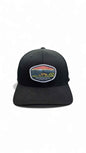 Moove Headwear black fitted cap with Shenandoah National Park sunset patch and curved brim.