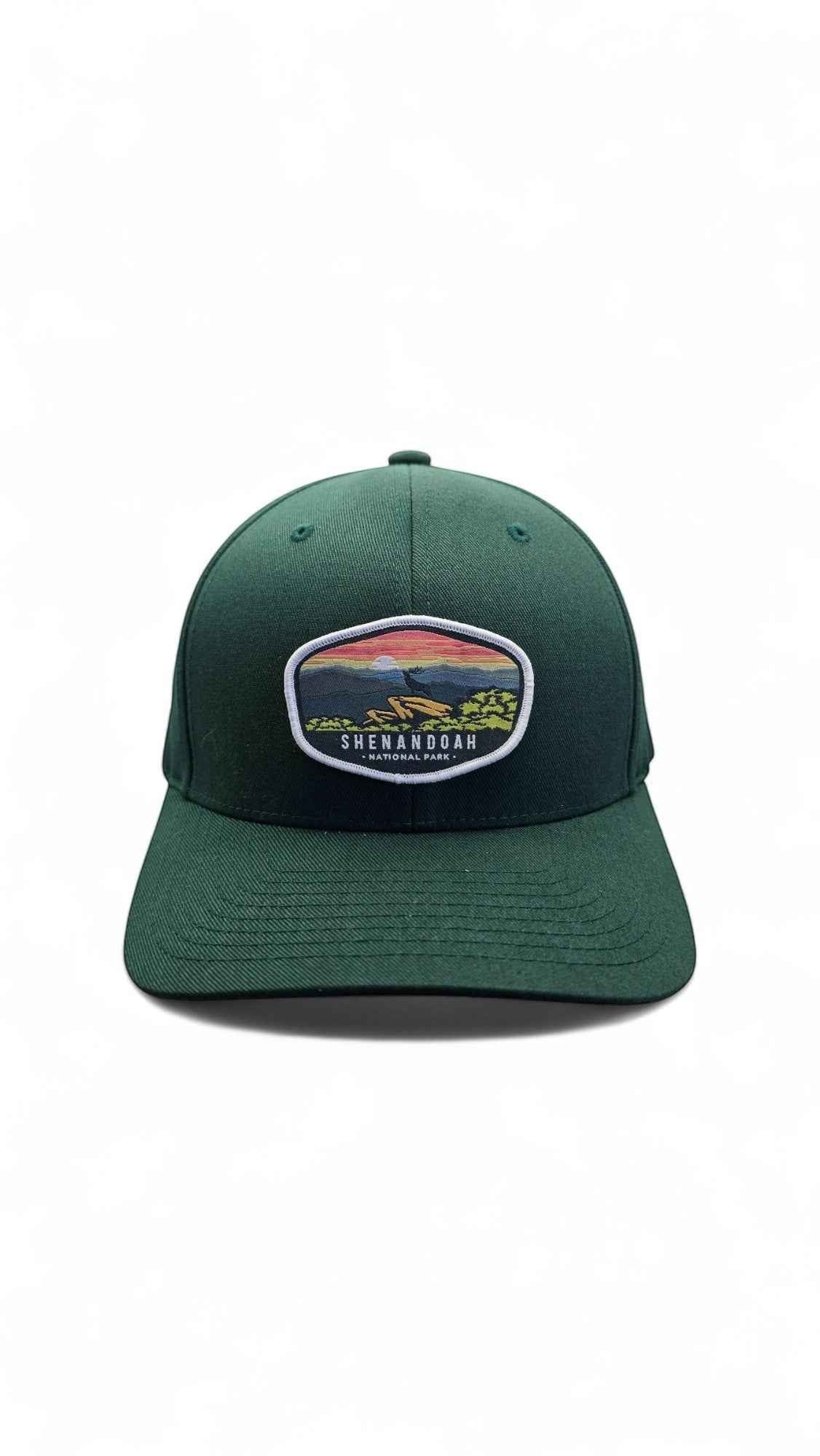 Moove Headwear dark green fitted cap with Shenandoah National Park sunset patch and curved brim.