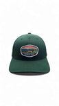 Moove Headwear dark green fitted cap with Shenandoah National Park sunset patch and curved brim.