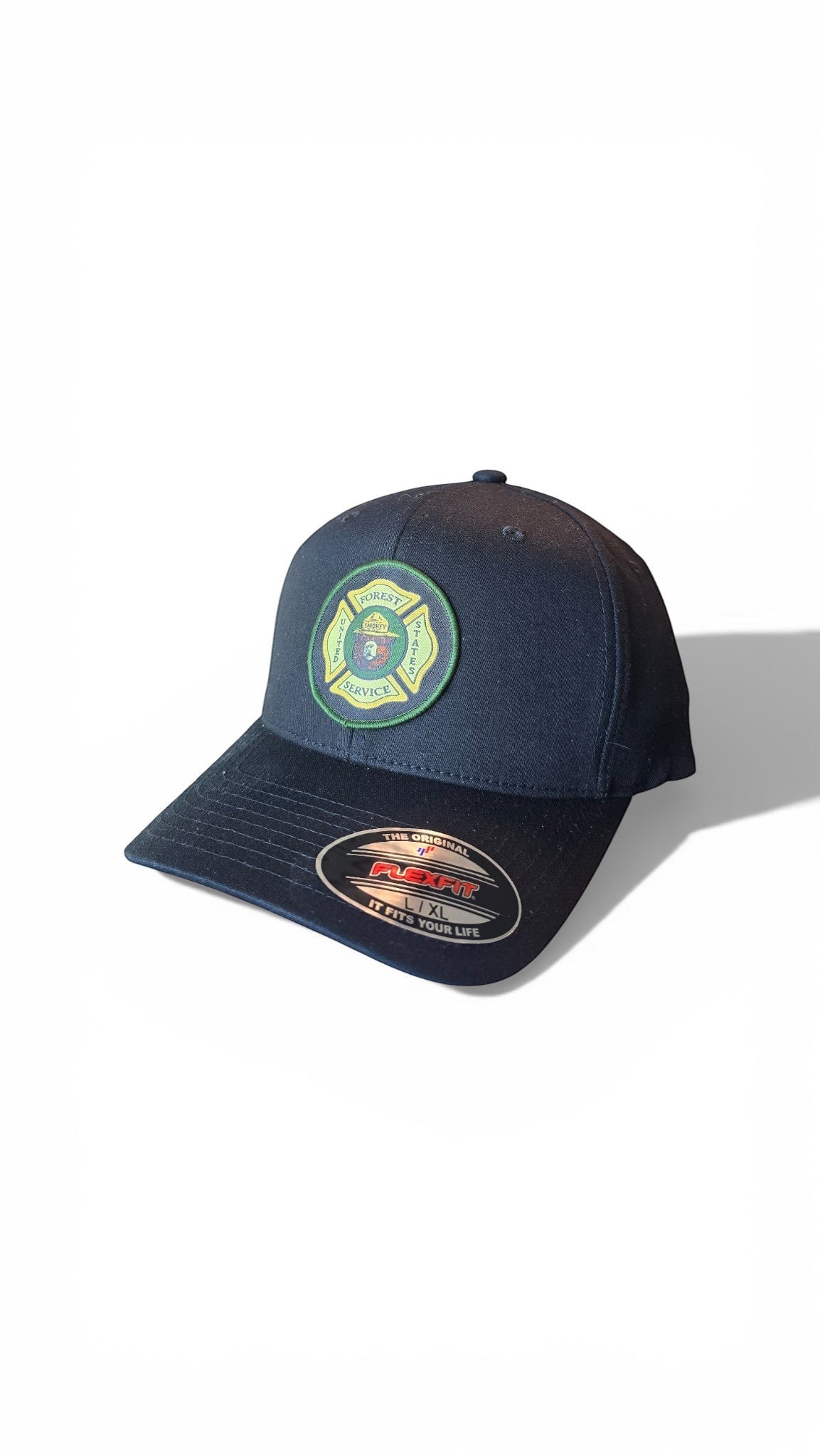 Moove Headwear navy blue baseball cap with official US Forest Service Smokey Bear logo patch. Adjustable fit.