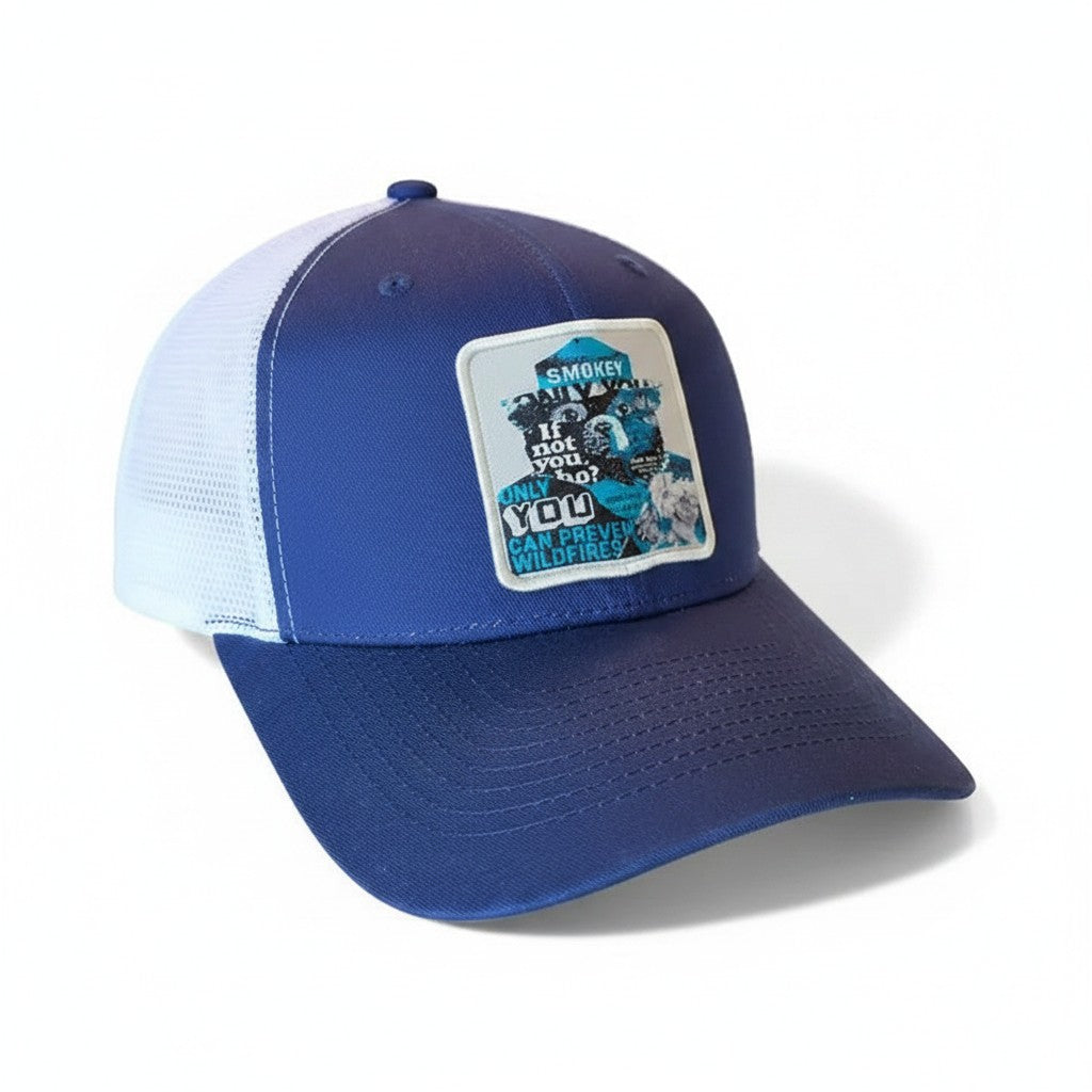 Moove Headwear blue and white mesh trucker hat with Smokey Bear graphic and "If not you, only you can prevent wildfires" text.