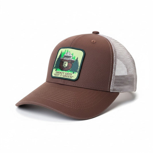 Moove Headwear brown trucker hat with mesh back and Smokey Bear patch saying "Keep It Green"