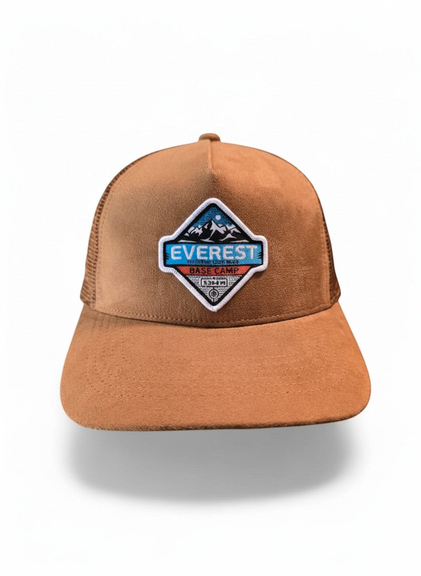 Moove Headwear brown suede trucker hat with mesh back and Everest Base Camp patch. Adjustable snapback.