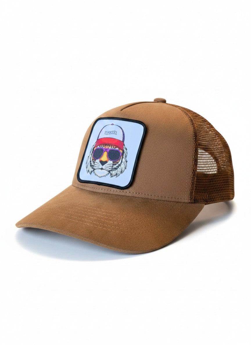 Moove Headwear brown suede trucker hat with mesh back and embroidered tiger patch wearing sunglasses.