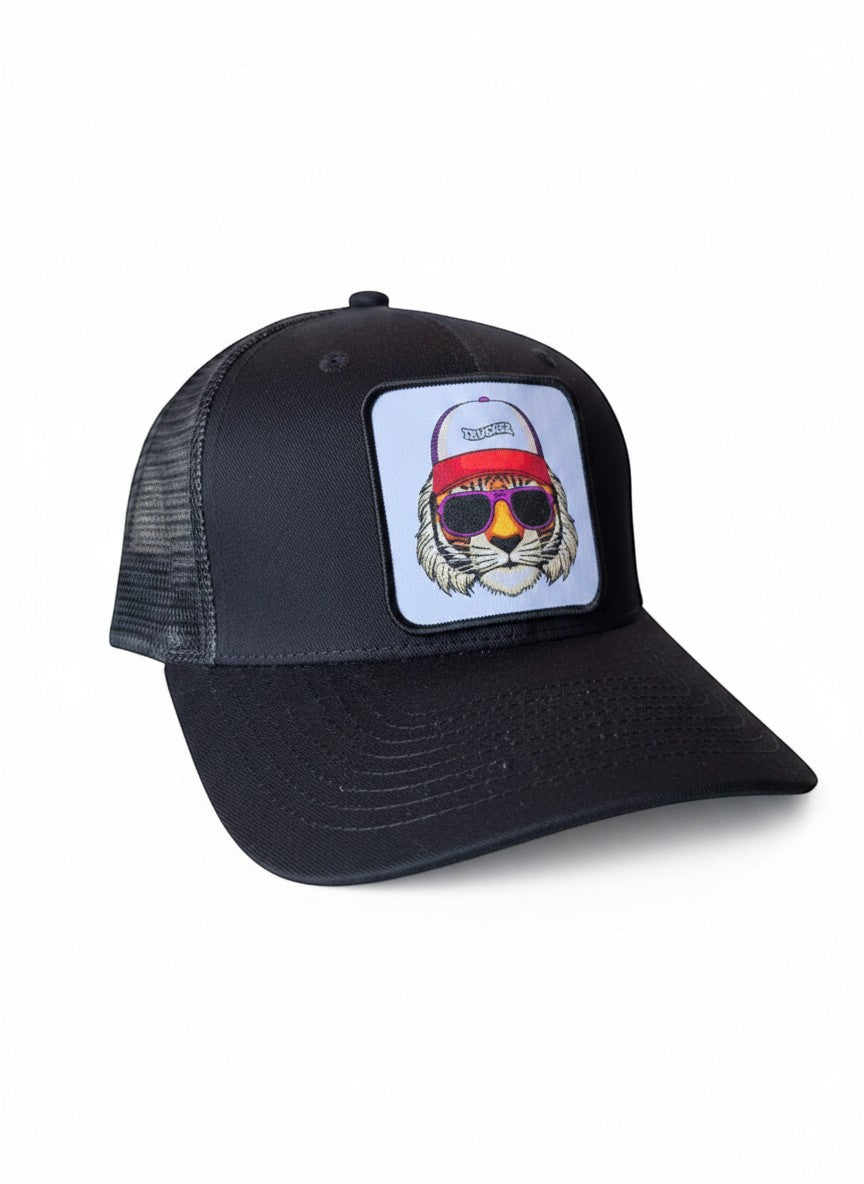 Moove Headwear black trucker hat with mesh back and a patch of a tiger wearing sunglasses and a trucker hat.