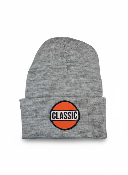 Moove Headwear heather gray knit beanie with a retro orange and white "CLASSIC" patch. Soft fabric with fold-over cuff.