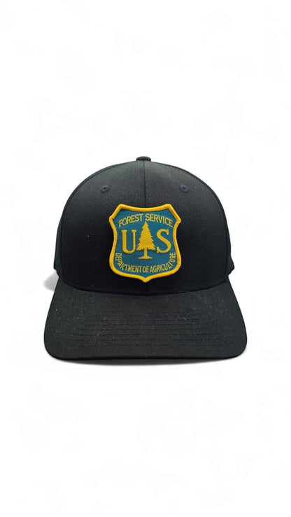 Moove Headwear black fitted cap with US Forest Service patch, 6-panel design, curved brim.