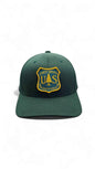 Moove Headwear dark green fitted cap with US Forest Service patch, curved brim, and 6-panel design.