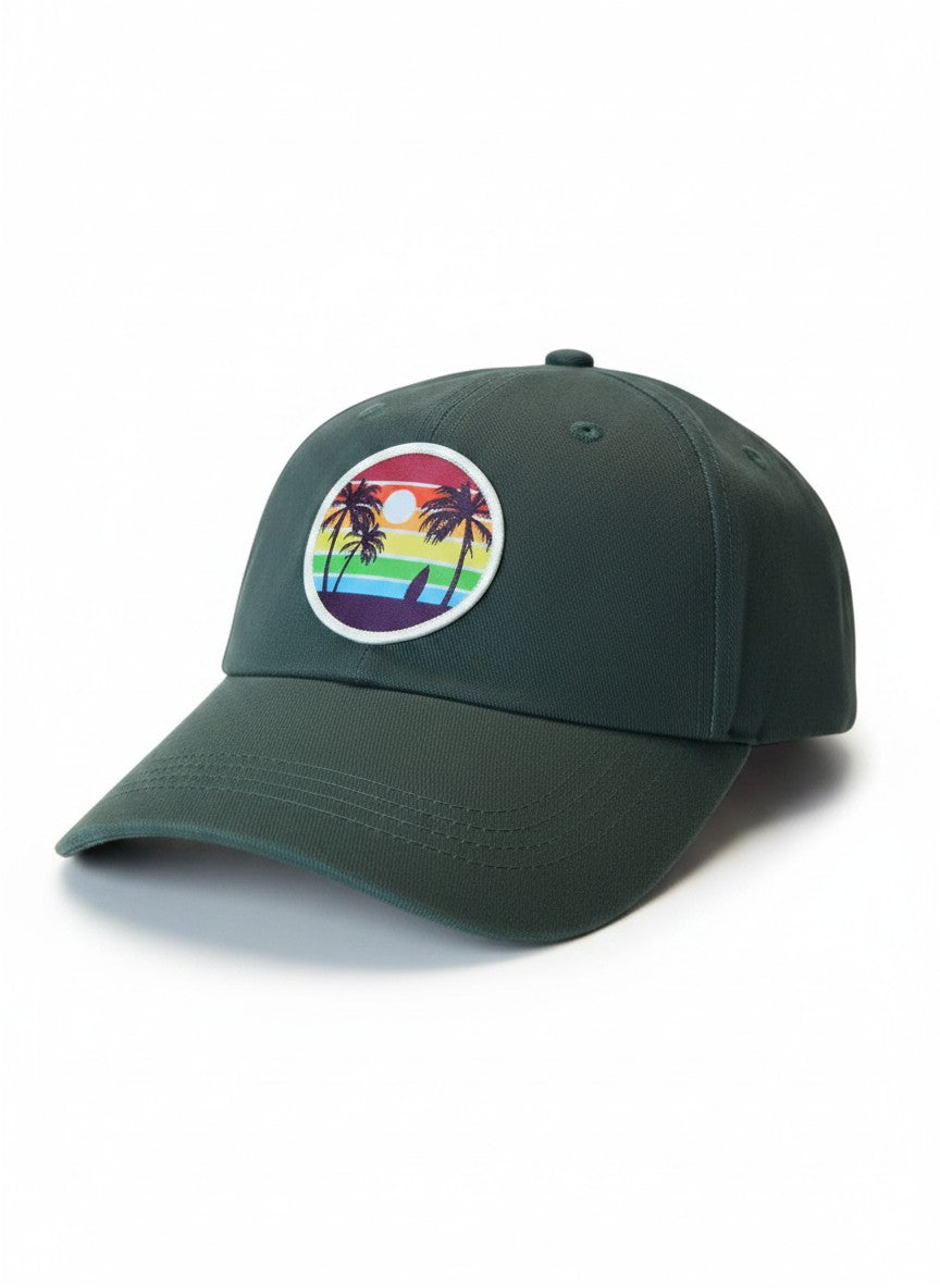 Moove Headwear dark green unisex baseball cap with a vintage rainbow sunset patch featuring palm trees and a surfboard.