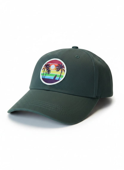 Moove Headwear dark green unisex baseball cap with a vintage rainbow sunset patch featuring palm trees and a surfboard.