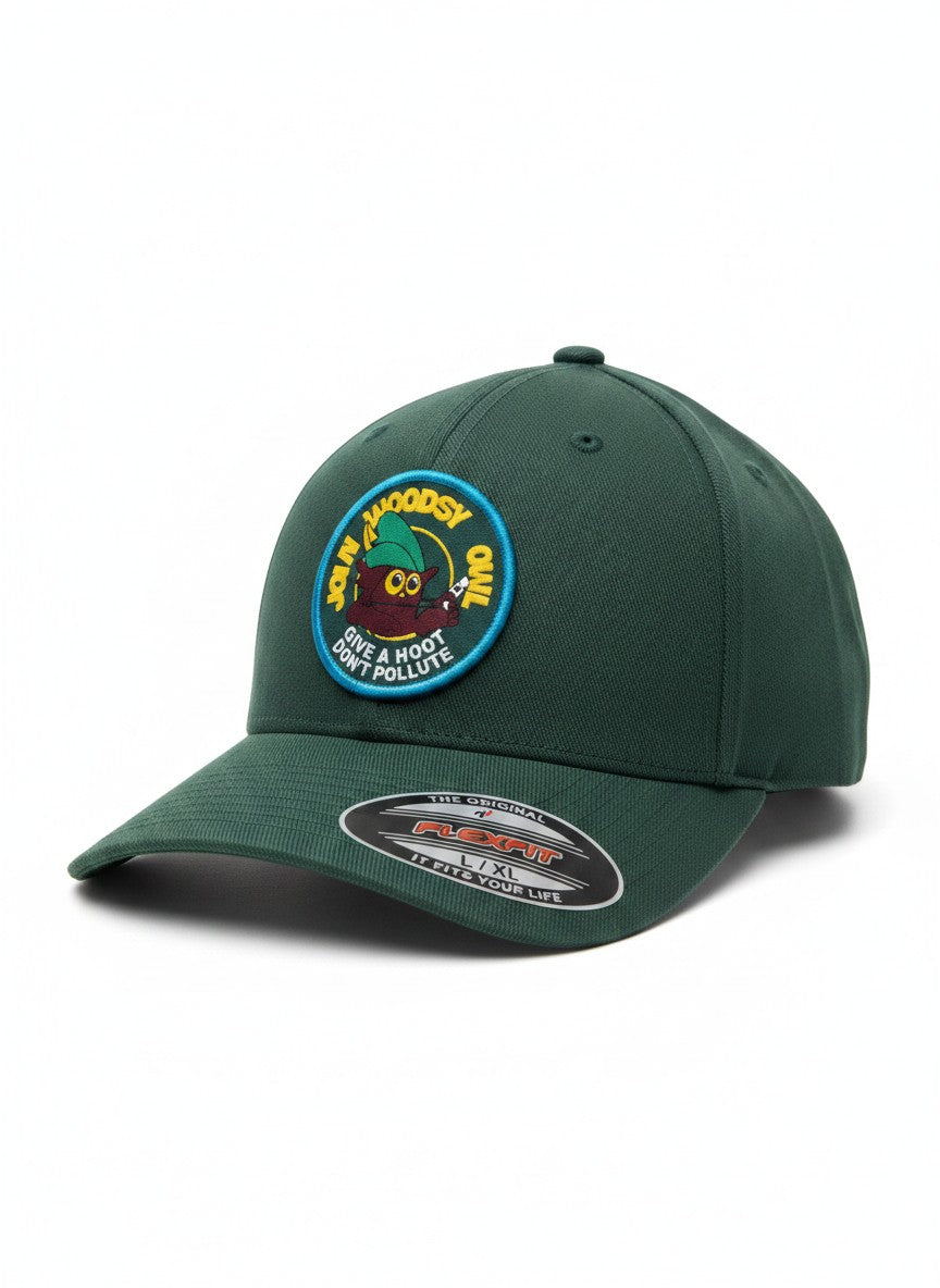 Moove Headwear dark green baseball cap with a woven patch featuring Woodsy Owl and the slogan "Give a Hoot, Don't Pollute."