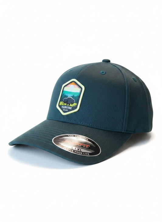 Moove Headwear dark teal fitted baseball cap with Yellowstone National Park embroidered patch featuring a bison and mountains.