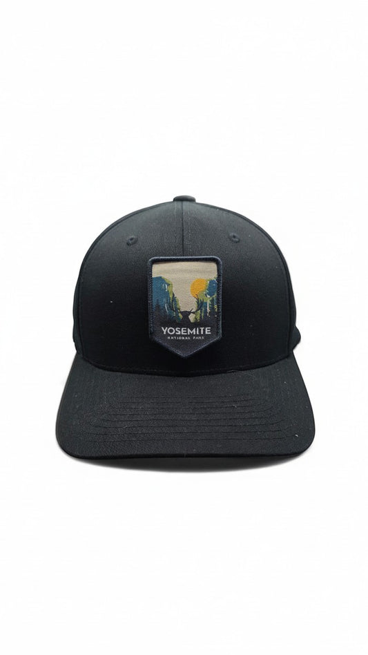 Moove Headwear black fitted cap with Yosemite National Park embroidered patch featuring a scenic landscape and deer.