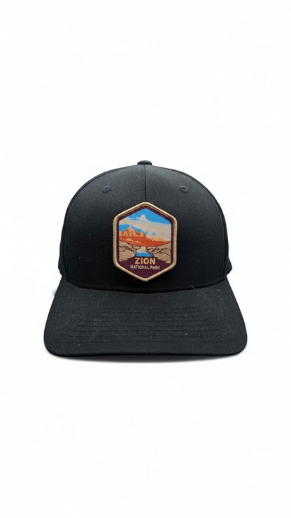 Moove Headwear black adjustable baseball cap with embroidered Zion National Park landscape patch.