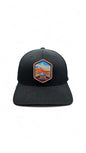 Moove Headwear black adjustable baseball cap with embroidered Zion National Park patch. Features a landscape scene with mountains and a river.