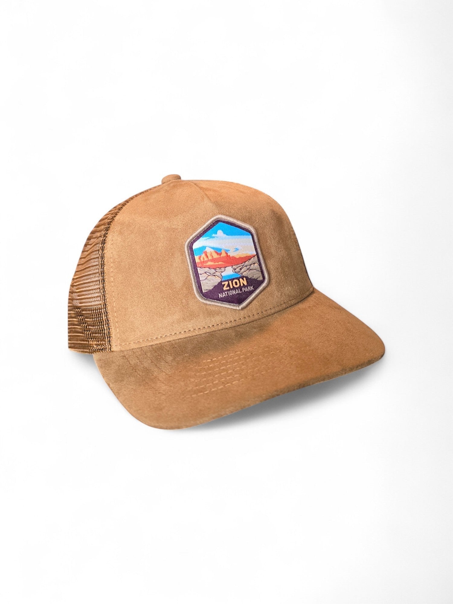 Moove Headwear tan suede mesh baseball cap with embroidered Zion National Park patch. Adjustable snapback for hiking.