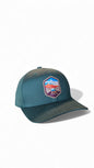 Moove Headwear teal adjustable baseball cap with embroidered Zion National Park patch. Features UV protection and breathable fabric.