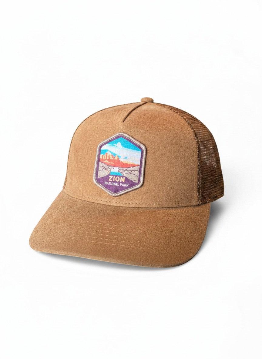 Moove Headwear tan suede mesh baseball cap with embroidered Zion National Park patch. Adjustable snapback.